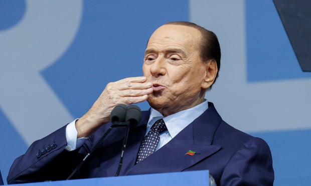 Silvio berlusconi speaking at a political rally