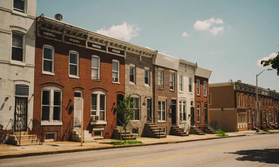 Blocks of row houses and young trees contribute to the heat issues in Baltimore.