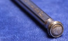 The silver pencil with the initials AH on the top end.