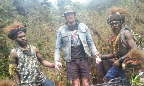 Phillip Mehrtens, a New Zealand pilot (centre), was kidnaped by separatist rebels in theIndonesian province of Papua in February.