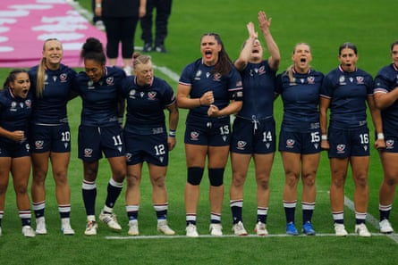 The USA players, including Ilona Maher (centre) react after singing their national anthem.