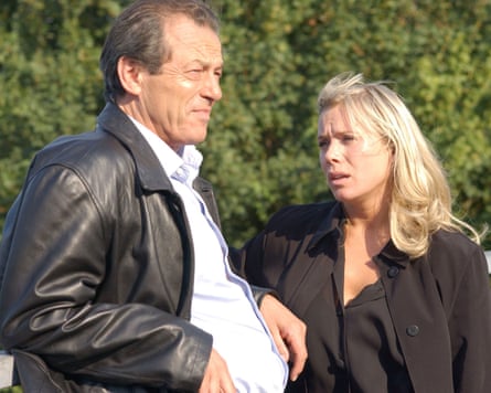 Leslie Grantham as Dirty Den and Letitia Dean as Sharon Watts.