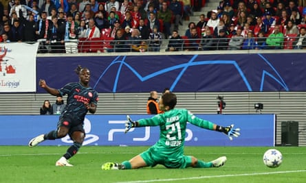 Manchester City's Jeremy Doku scores their third goal against RB Leipzig