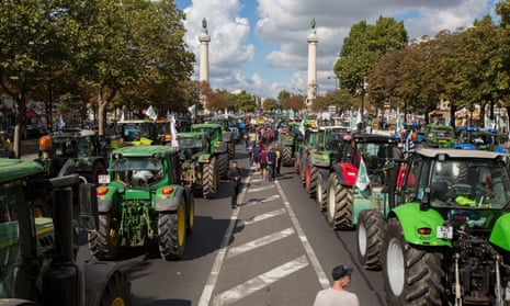 French farmers with their tractors take part in a protest at the Place de la Nation