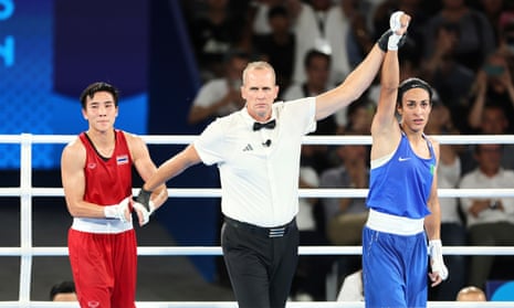 Imane Khelif celebrates defeating Janjaem Suwannapheng in the 66kg semi-finals.