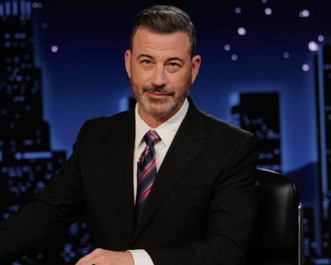 a man in a suit smiling