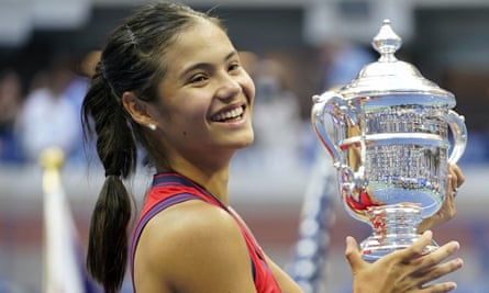 Emma Raducanu holds the US Open trophy. She won coming through qualifiers and not losing a set in the tournament.