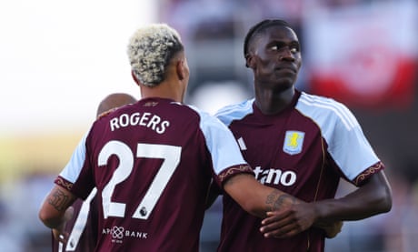 Morgan Rogers celebrates scoring a goal with Amadou Onana