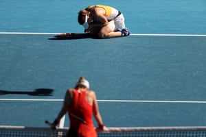 Alize Cornet (top) celebrates her win as a dejected Simona Halep waits at the net
