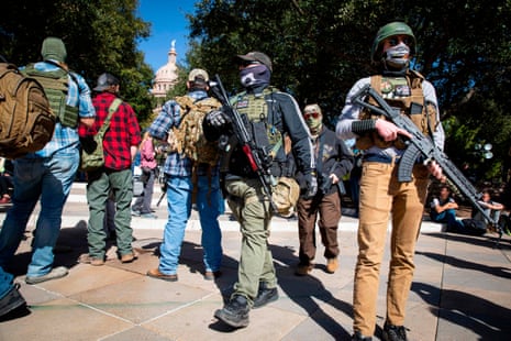 Armed groups hold a rally in front of a closed Texas State Capitol in Austin, Texas, on January 17, 2021 during a nationwide protest called by anti-government and far-right groups supporting Donald Trump and his false claims of electoral fraud.