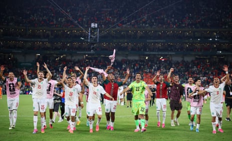 Morocco players celebrate qualifying it to the round of 16.