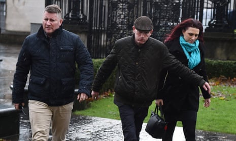 Paul Golding, left, arriving with Jayda Fransen, right,  at Belfast magistrates court.