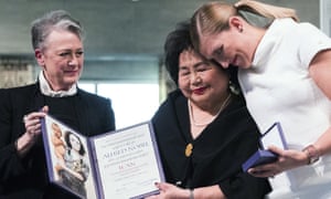 Leader of the Nobel committee Berit Reiss-Andersen, left, presents the award to Hiroshima survivor Setsuko Thurlow and Beatrice Fihn, leader of International Campaign to Abolish Nuclear Weapons in Oslo