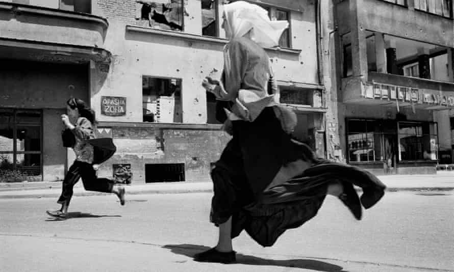 Women run across ‘Sniper Alley’ in Sarajevo, 1995.