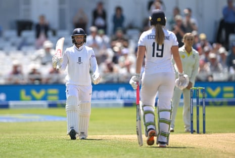 Danni Wyatt raises her bat to acknowledge her hard-fought fifty.