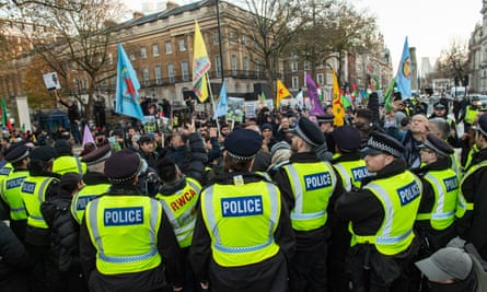 Metropolitan police deploy a heavy presence as Kurdish groups march from Trafalgar Square to Downing Street on 1 December 2024