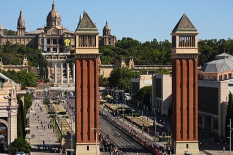 Team Pinarello Q36.5 pass along Plaza de Espanya.