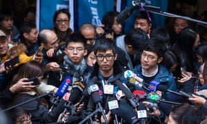 Wong (left), with Alex Chow (centre) and Nathan Law outside Hong Kong’s court of final appeal, February 2018.