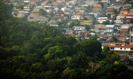 The expanding city of Manaus encroaches on the surrounding jungle. 