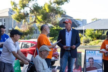 Cory Bernardi (right), meets voters at an Adelaide polling booth