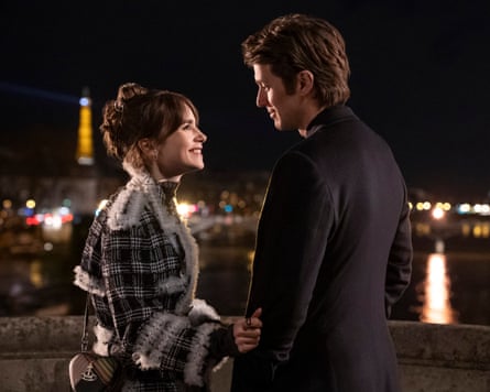 Lily Collins as Emily and Lucas Bravo as Gabriel in Emily in Paris.
