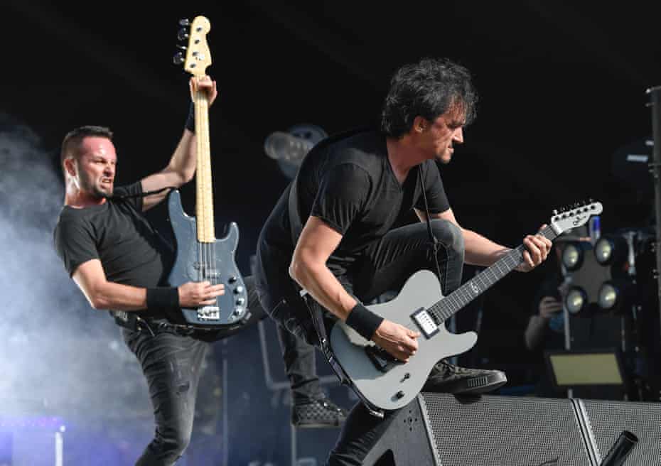 Joe Duplantier (right) and Jean-Michel Labadie performing with Gojira in 2019