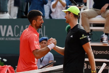 Novak Djokovic shakes hands with Poland's Hubert Hurkacz after winning the final