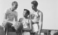 Wat Misaka (center) with his New York Knicks teammates Joe Lapchich and Lee Knorek in 1947
