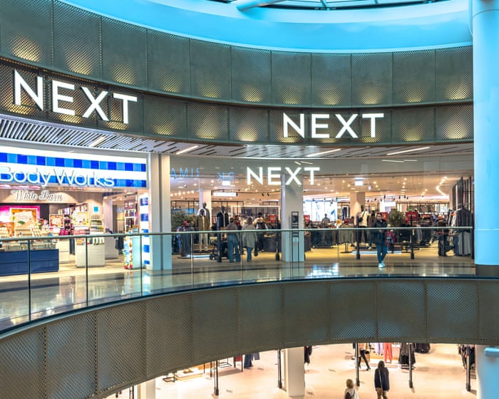 Sweltering summer lifts Next sales as profit outlook upgraded again — image supplied by The Guardian UK's feed