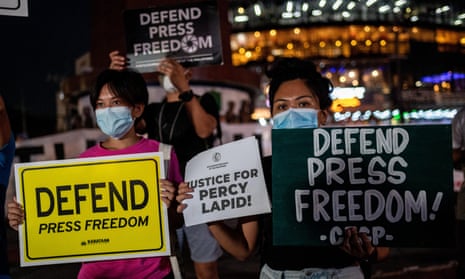 Journalists and activists hold a rally following the killing of Filipino journalist Percival Mabasa, also known as Percy Lapid, in Quezon City, Metro Manila