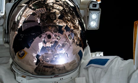 Expedition 65 Flight Engineer Thomas Pesquet of the European Space Agency takes a ‘space-selfie’ during Wednesday’s first spacewalk to install new roll out solar arrays on the International Space Station