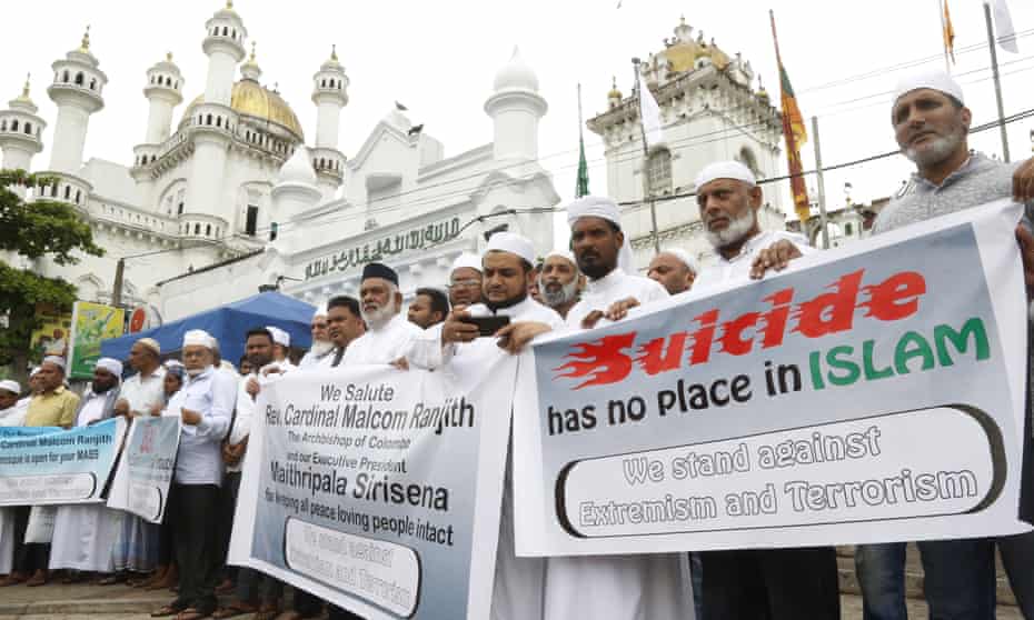 Sri Lankan Muslims gather in Colombo on 26 April to protest against violence.