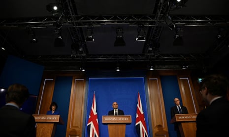 Sajid Javid, centre, at Wednesday’s press conference in Downing Street, with Stephen Powis, NHS England national medical director, and Dr Jenny Harries, the UK Health Security Agency chief executive.