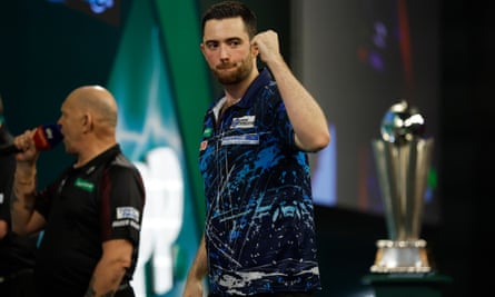 Luke Humphries celebrates victory in World Darts Final