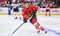 Chicago Blackhawks forward Connor Bedard (98) skates against the St Louis Blues during the first period of a preseason game at United Center.