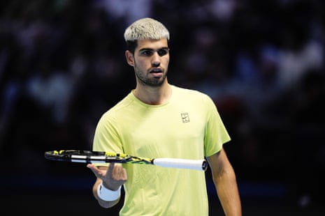 Carlos Alcaraz waits for medical assistance among the crowd match interrupted