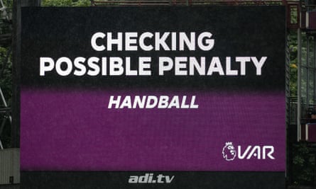 The VAR board announcing a check for handball during the Premier League match between Aston Villa and Newcastle United at Villa Park