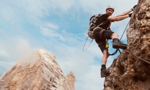 Andrew Gilchrist on Punta Anna via ferrata route up Tofana di Mezzo. Mountain behind is Tofana di Rozes.