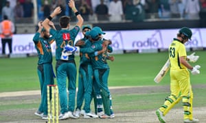 Pakistan cricketers celebrate after defeating Australia in the second T20 cricket match in Dubai on Friday
