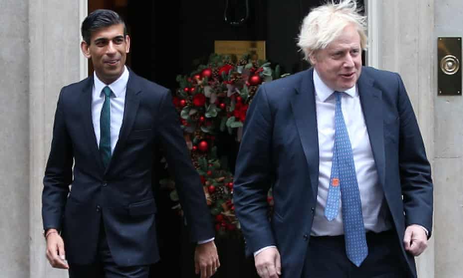 Rishi Sunak and Boris Johnson outside Downing Street.
