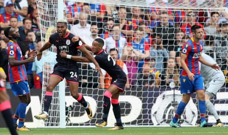Huddersfield’s Steve Mounié celebrates the first of his goals at Palace.