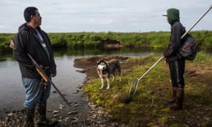 People and a dog hunt for ducks near Newtok, Alaska. Newtok has a population of approximately of 375 ethnically Yupik people.
