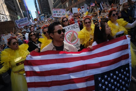 people holding signs