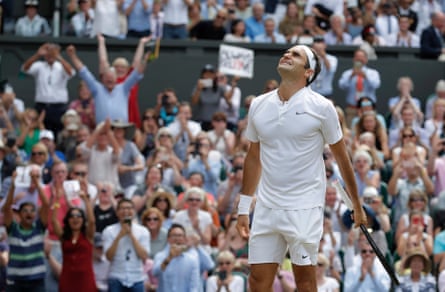 Roger Federer celebrates winning the men’s singles final for a record eighth time on Centre Court.