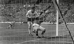 Harry Gregg for Manchester United in collision with Nat Lofthouse of Bolton Wanderers during the 1958 FA Cup final, which Bolton won 2-0.