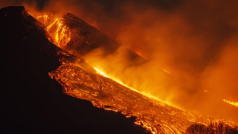 Mount Etna: footage captures volcano erupting at night, illuminating sky – video