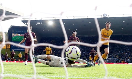 Jørgen Strand Larsen scores for Wolves against Manchester City.