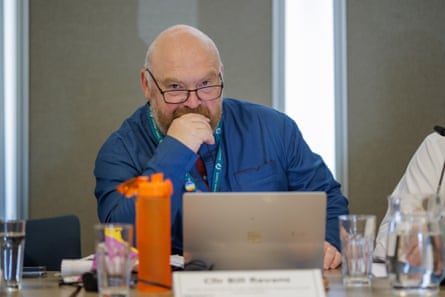 Bill Revans looks into the camera at a council meeting