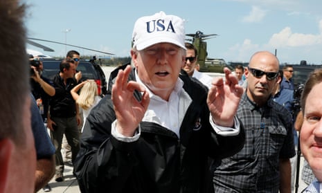 Trump greets people as he arrives to view Hurricane Irma recovery efforts in Naples, Florida. On Air Force One, he described a ‘great talk’ with Tim Scott.