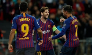 Coutinho and Suárez celebrate with Lionel Messi during Barcelona’s 4-2 win over Tottenham at Wembley.